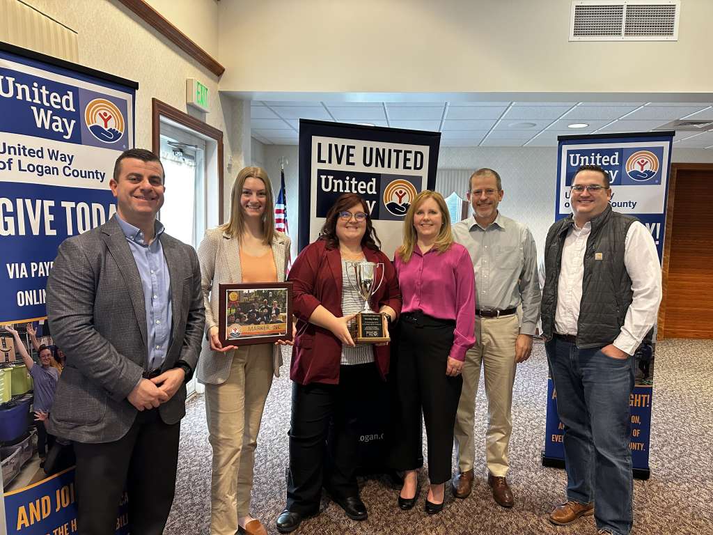 Group photo of Marker team accepting the Traveling Trophy and Gold awards. 